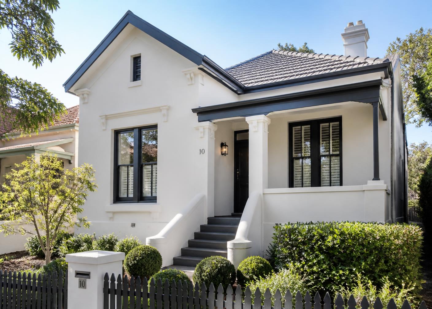 Repainted Sydney home exterior in soft stone white with charcoal trim